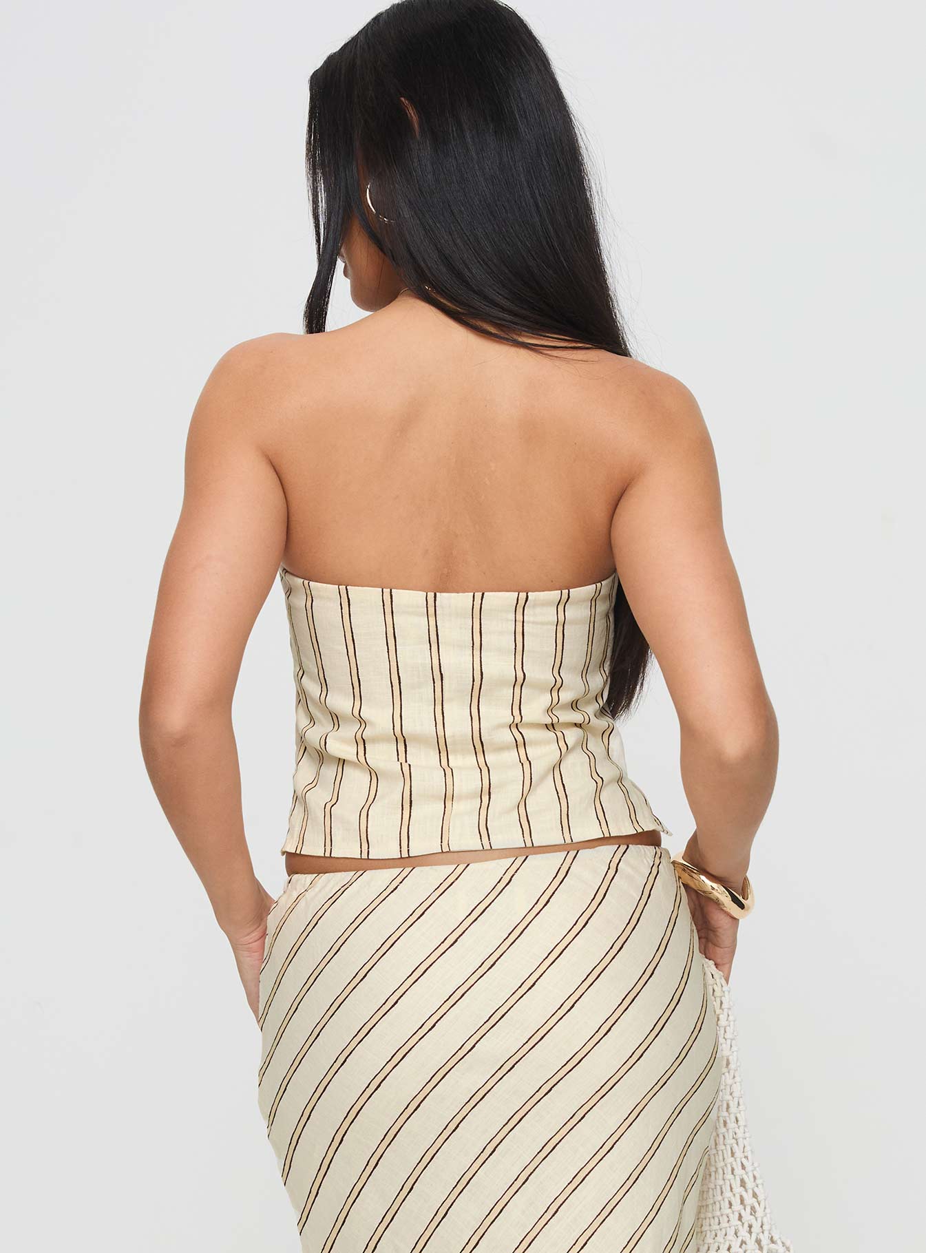 back view of model wearing Princess Polly Birdie Asymmetric Linen Blend Top Cream Sleeveless straight 