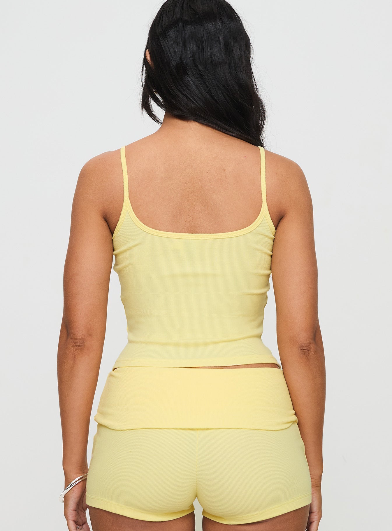back view of model wearing Princess Polly Baseline Rib Top Yellow Sleeveless Square Neck 