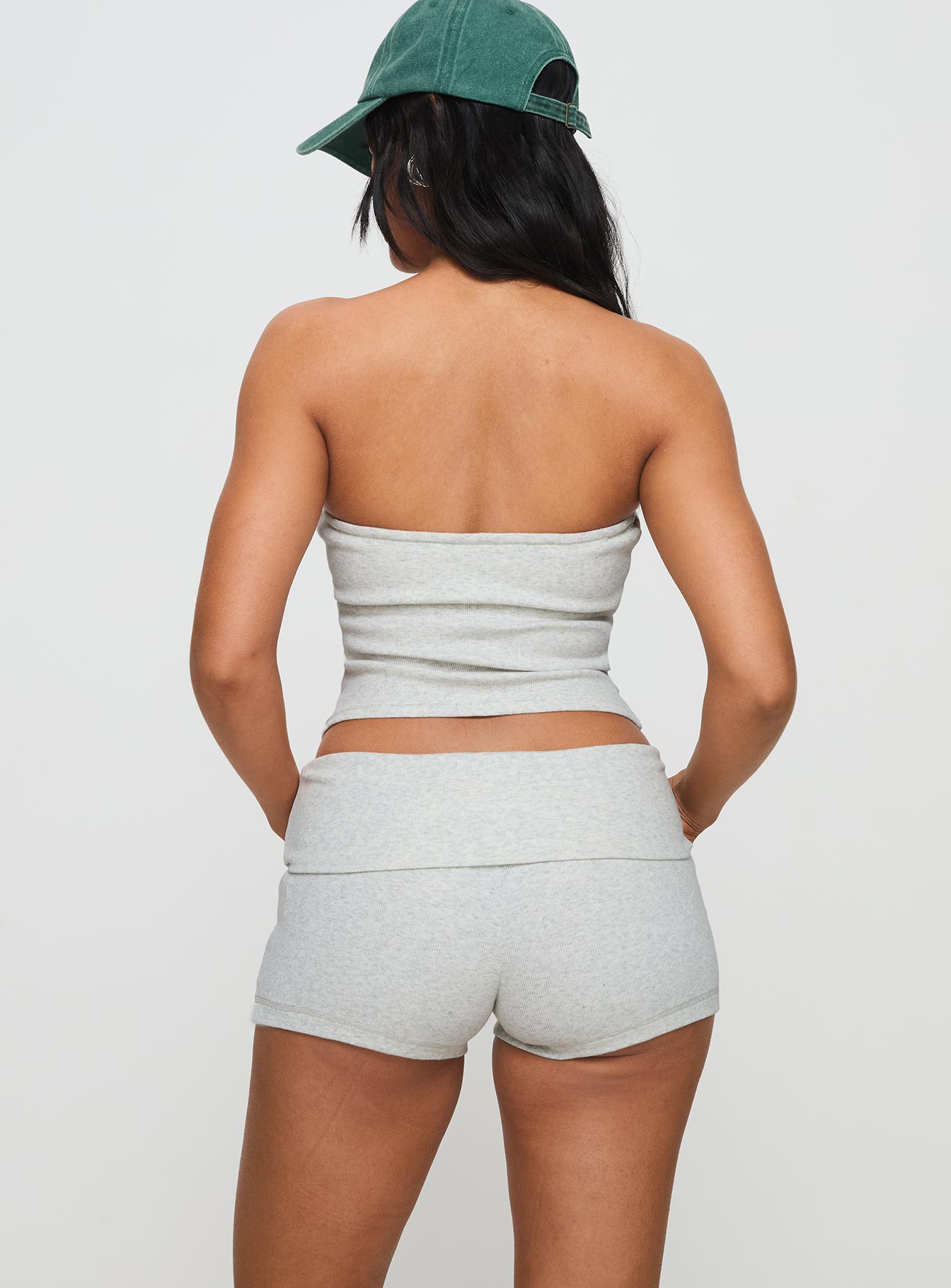 back view of model wearing Princess Polly Baseline Low Rise Rib Shorts Grey Marle Low Rise Shorts 