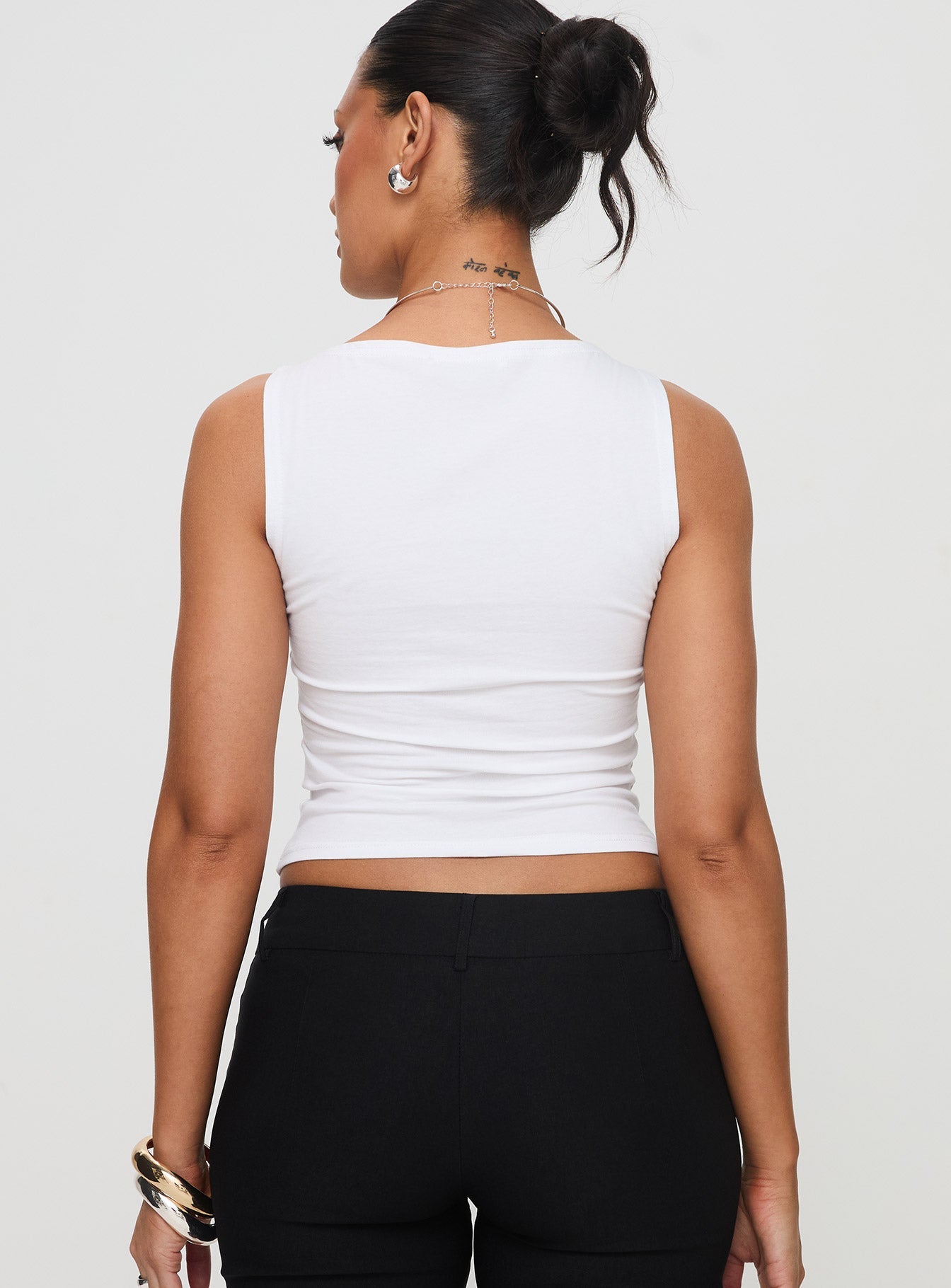 back view of model wearing Princess Polly Fitzy High Neck Top White Sleeveless Crew Neck 