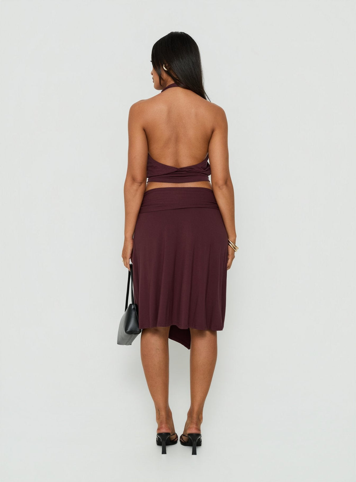 Presenting the Soft Focus Tie Waist Midi Skirt Plum Noir womens-skirts in maroon back view of model wearing Princess Polly