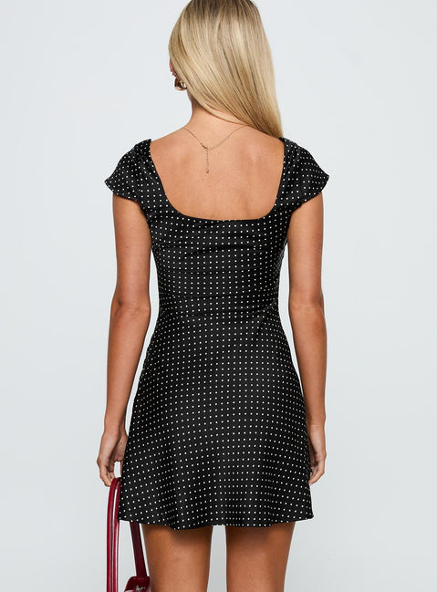 back view of model wearing Princess Polly Lucienna Polka Dot Mini Dress Black / White Square Neck 