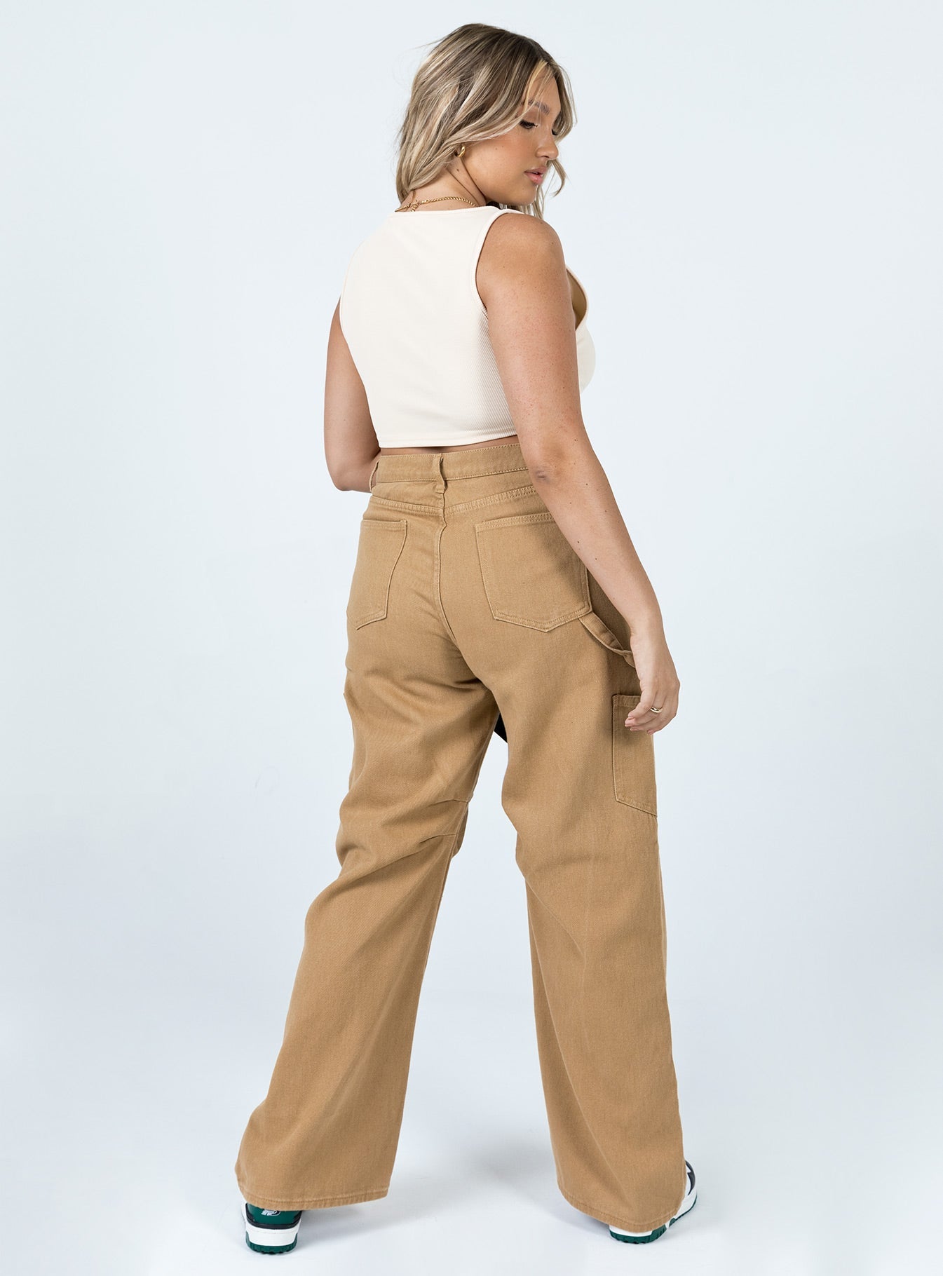 back view of model wearing Princess Polly Miami Vice Pants Stone Mid Rise 