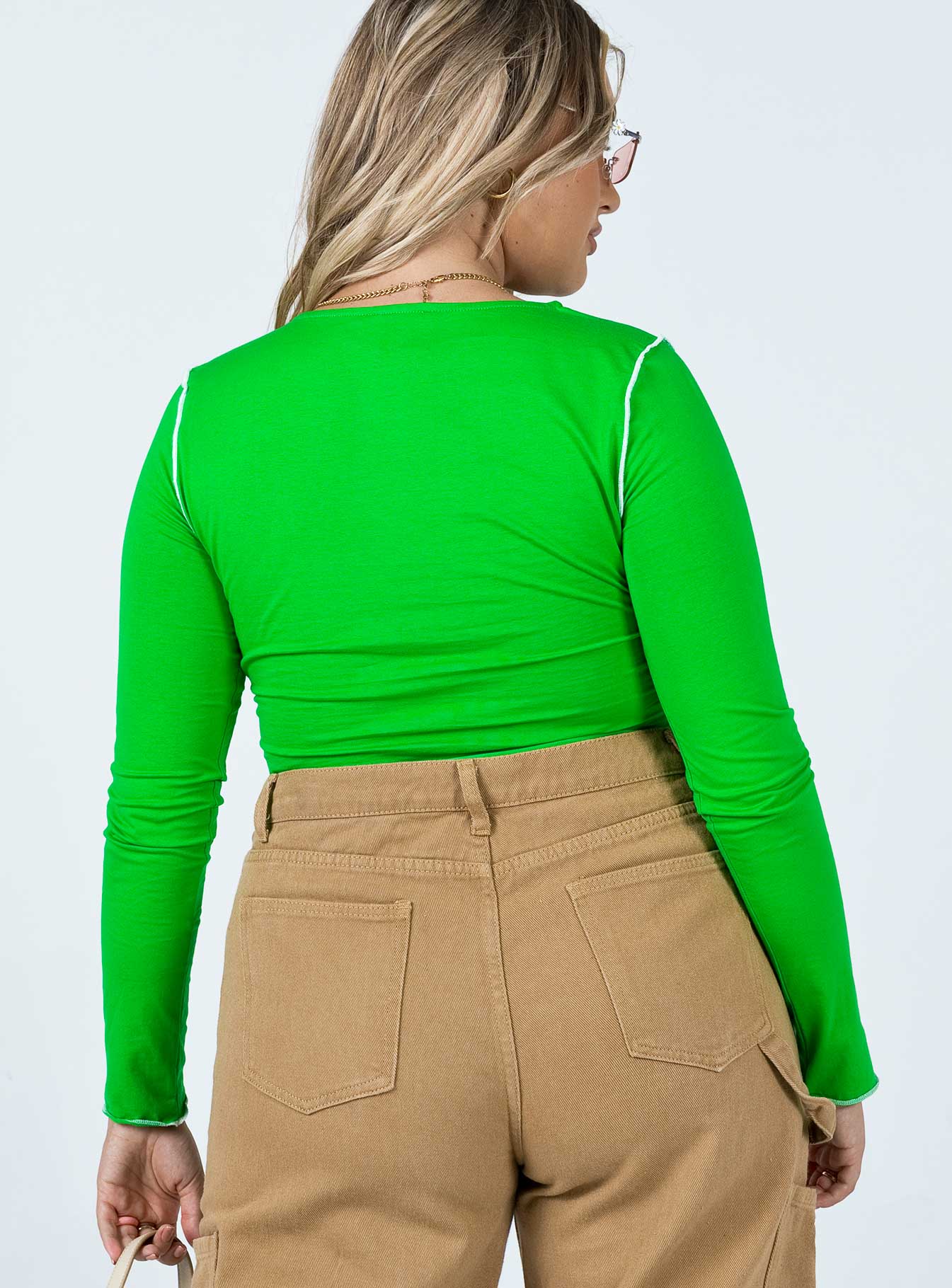 back view of model wearing Princess Polly Good Vibes Long Sleeve Top Green 