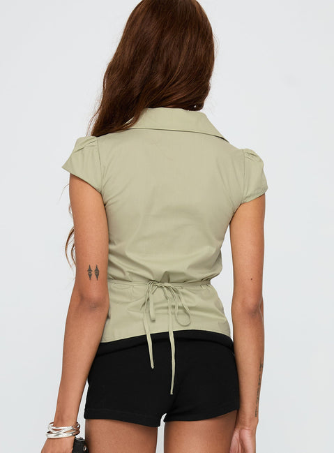 back view of model wearing Princess Polly Arianwyn Short Sleeve Shirt Sage Short Sleeves V-Neck 