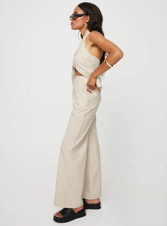Matching linen set Halter neck top, fixed halter strap, button fastening at front, twin hip pockets High rise pants, belt looped waist, zip and button fastening, elasticated waistband at back, twin hip pockets, straight leg