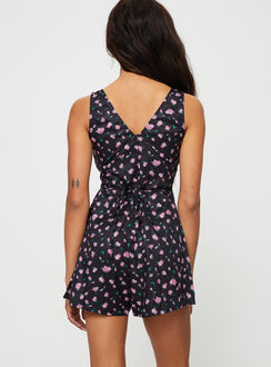 Floral romper V-neckline, slight ruching at bust, invisible zip and tie fastening at back