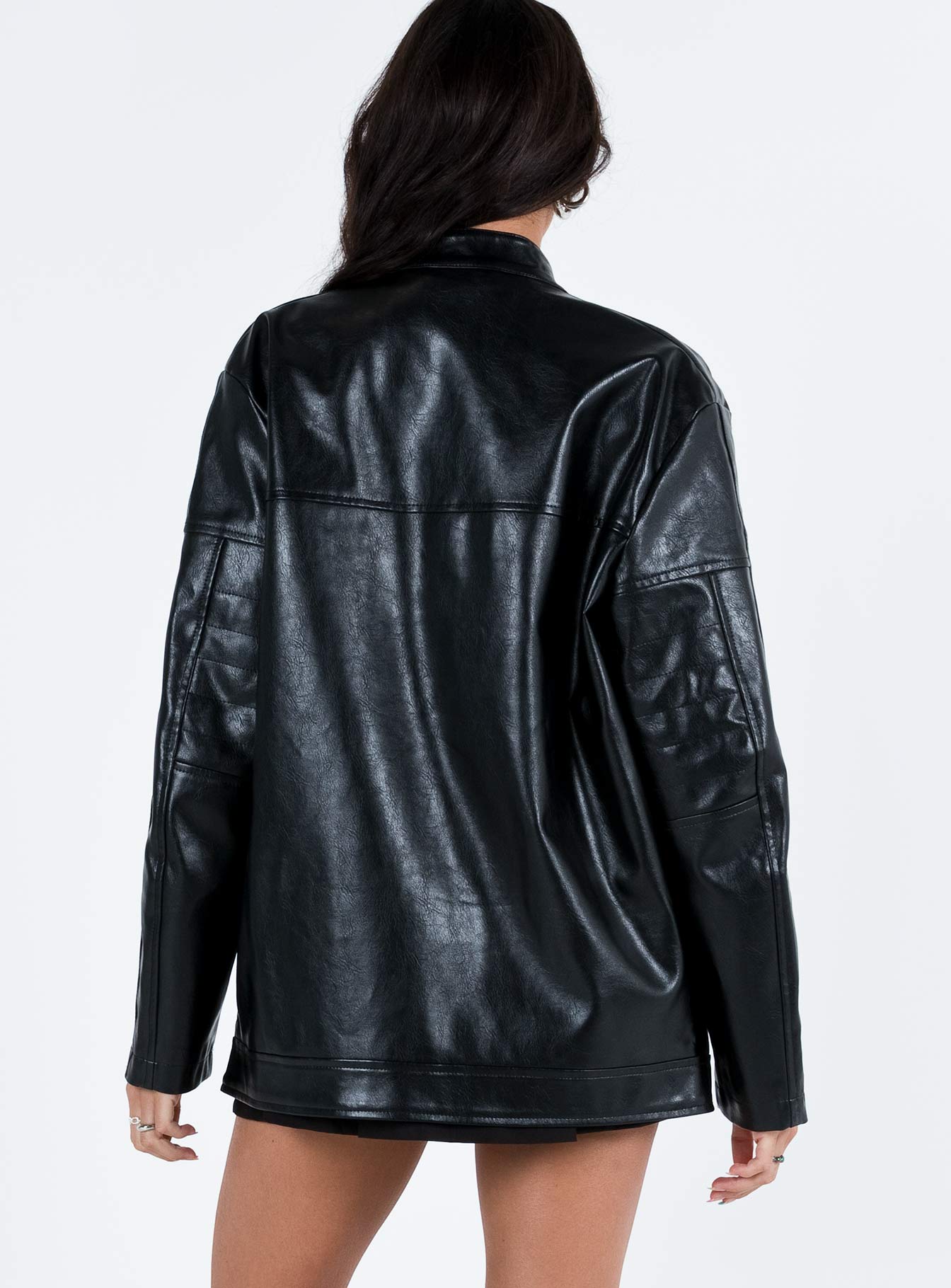 Black jacket Faux leather material Twin press button fastening at neck Zip fastening at front