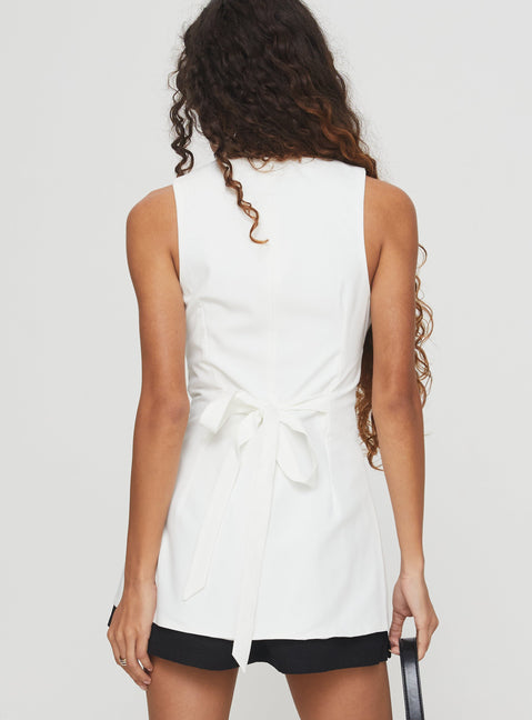 back view of model wearing Princess Polly Mystick Vest Top White Sleeveless Crew Neck 