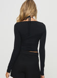 Long sleeve top Cropped fit, square neckline, cross-over halter detail Good stretch, unlined  Princess Polly Lower Impact 