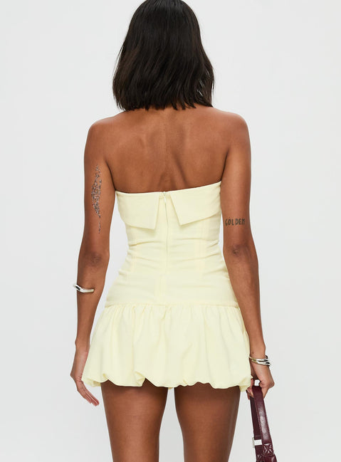 back view of model wearing Princess Polly Mousse Strapless Mini Dress Lemon Straight Neck 
