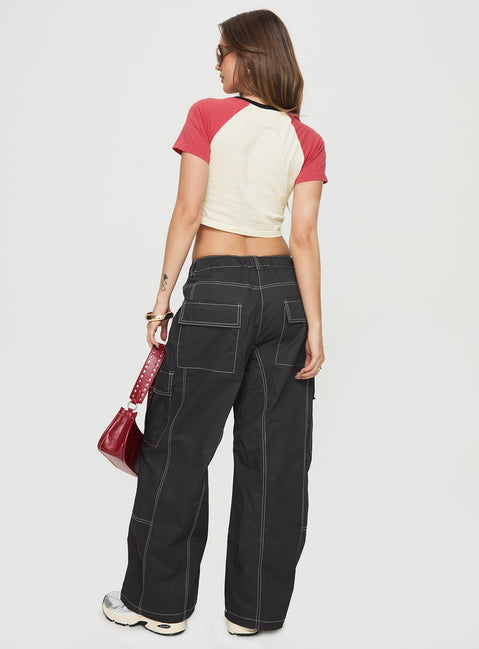 back view of model wearing Princess Polly Soria Cargo Pants Black Low Rise Pants 
