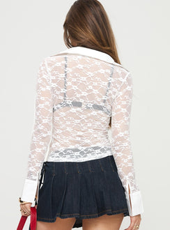 Long sleeve top Collared, lace material, button fastening Good stretch, unlined, sheer