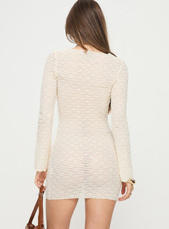 Long sleeve mini dress Knit material, high neckline, flared sleeves Good stretch, unlined, sheer