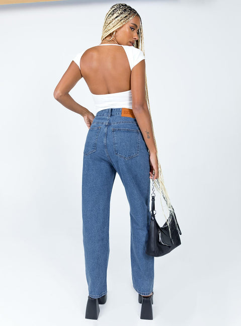 back view of model wearing Princess Polly Palais Mom Jeans Mid Wash Denim High Waisted 