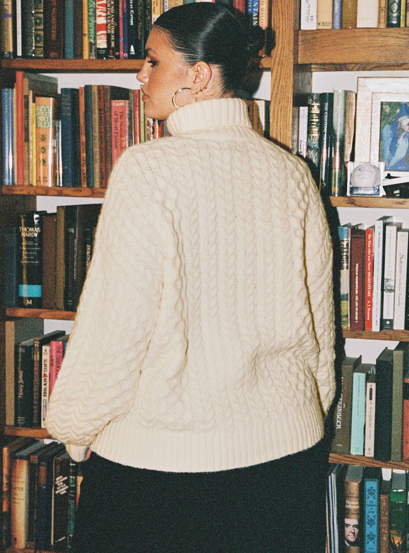 back view of model wearing Princess Polly Judson Roll Neck Cable Knit Sweater Cream Curve regular 