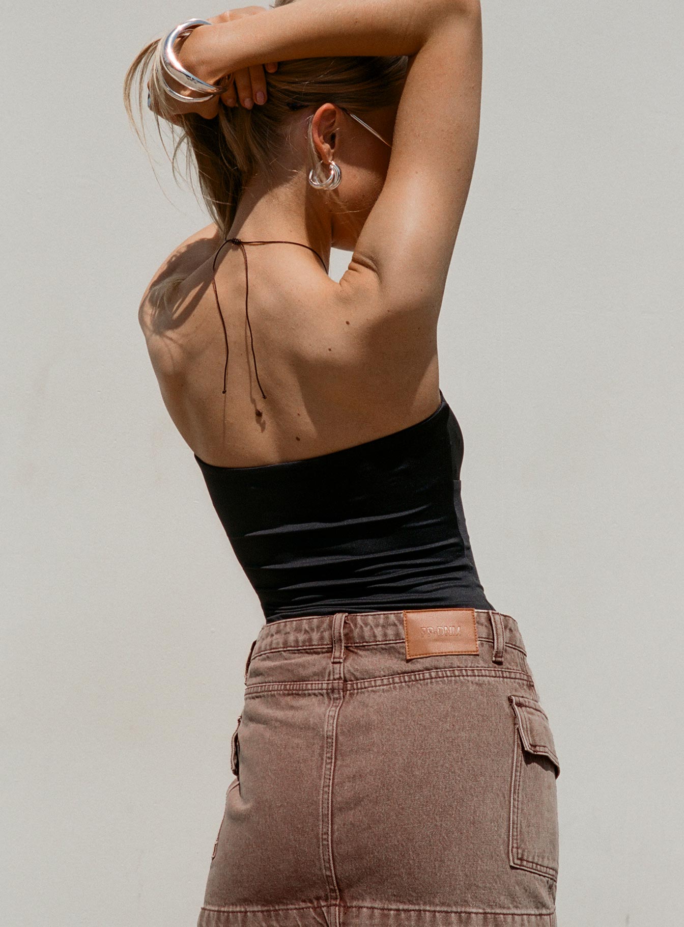 back view of model wearing Princess Polly Turlock Cut Out Strapless Top Black Sleeveless straight 