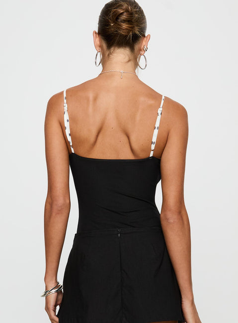 back view of model wearing Princess Polly Evette Bodysuit Black / White Sleeveless 