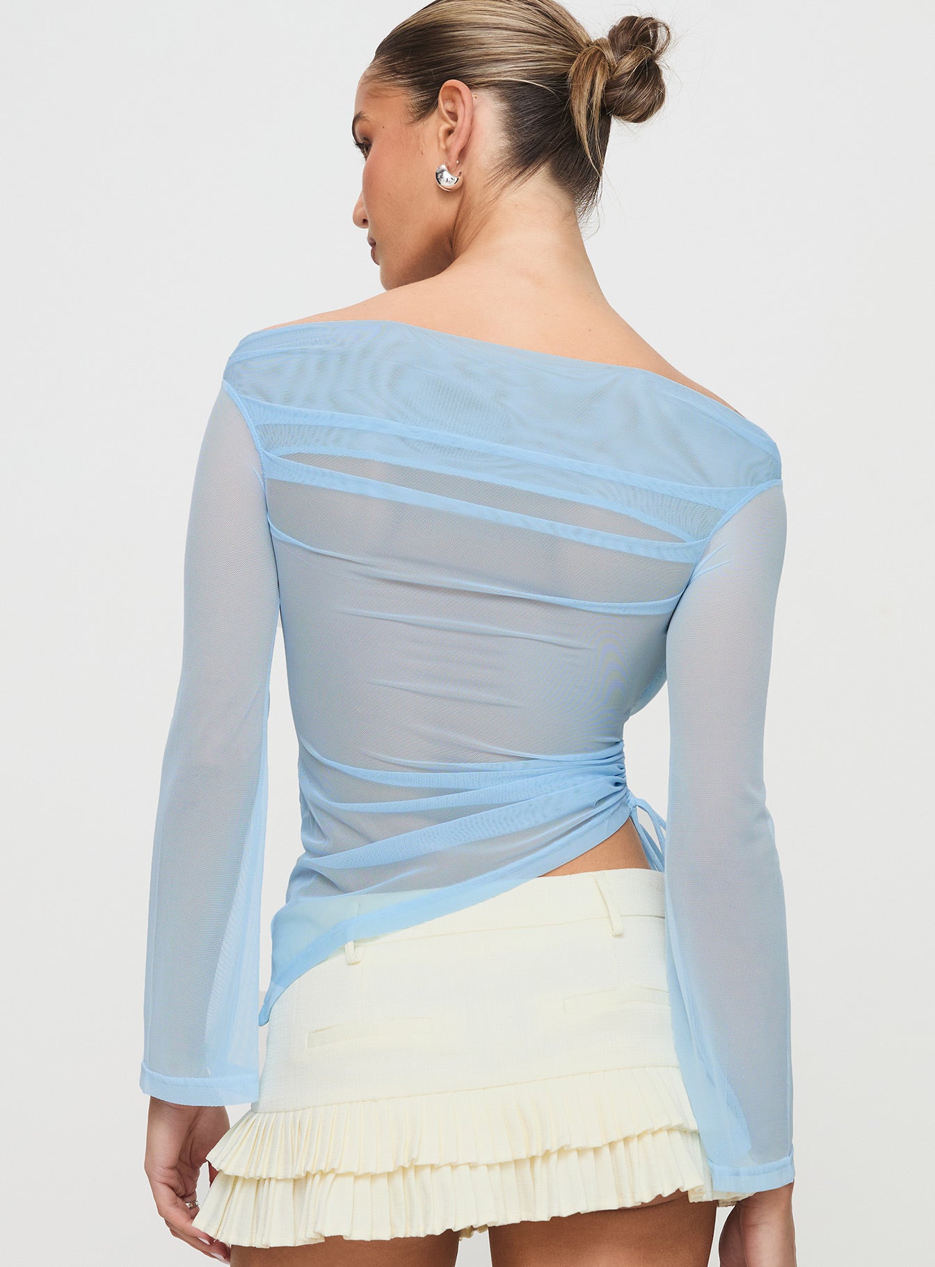 back view of model wearing Princess Polly Telescopic Off Shoulder Top Blue Full Sleeves straight 