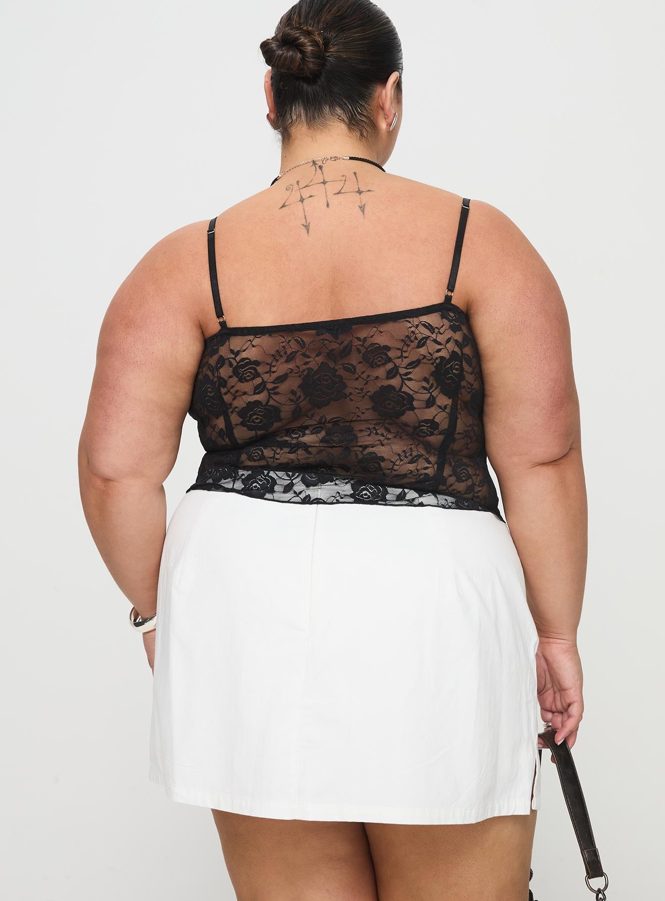 back view of model wearing Princess Polly Gigi Skort White Curve High Waisted Shorts 