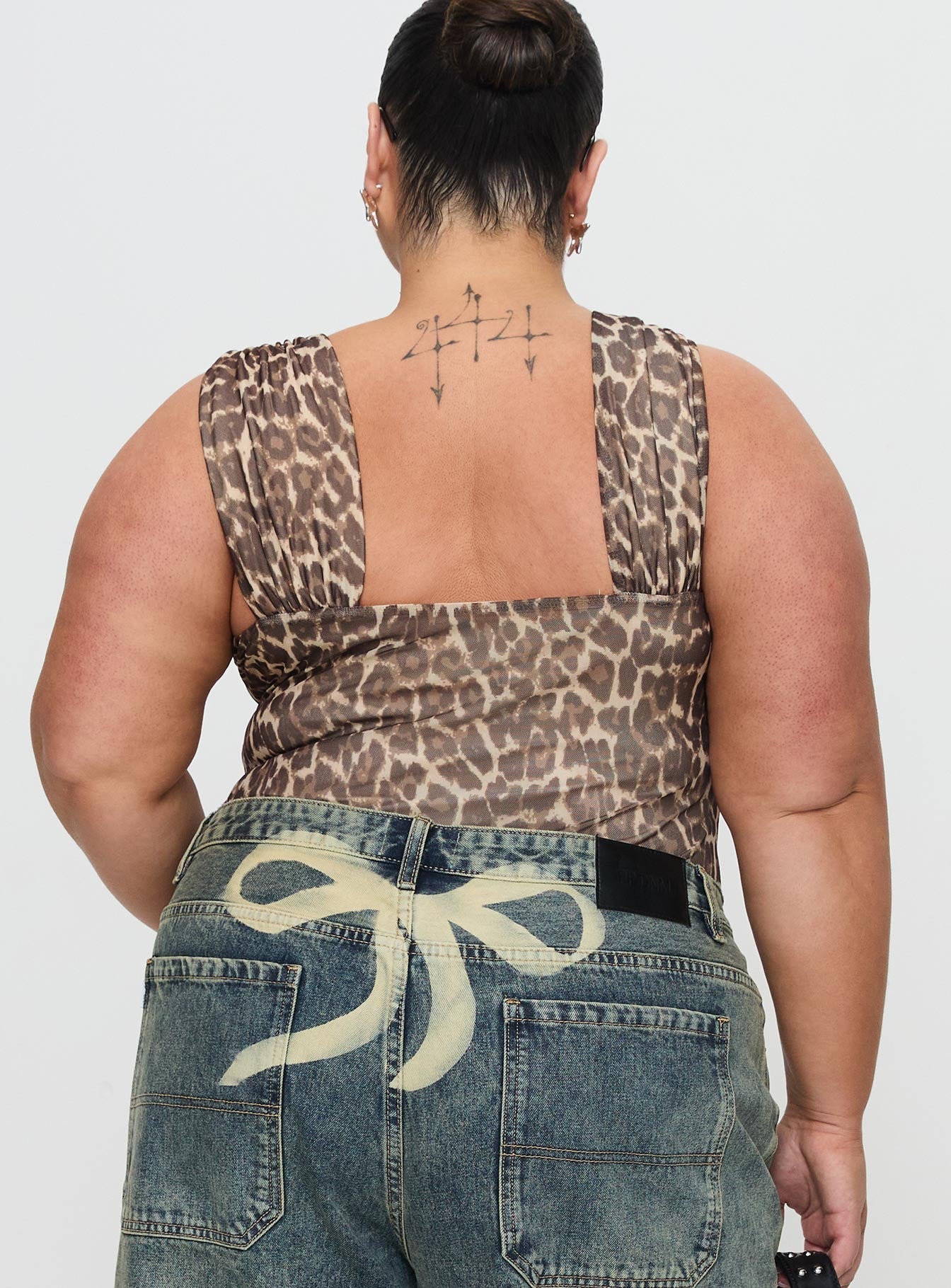 back view of model wearing Princess Polly Serenata Bodysuit Leopard Sleeveless 