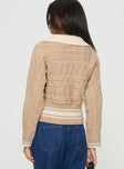 Knit sweater Oversized collar, ribbed trim detail Slight stretch, unlined 