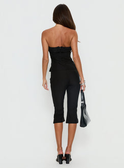 back view of model wearing Princess Polly Isalyn Tailored Capri Pants Black Pinstripe High Rise Pants 