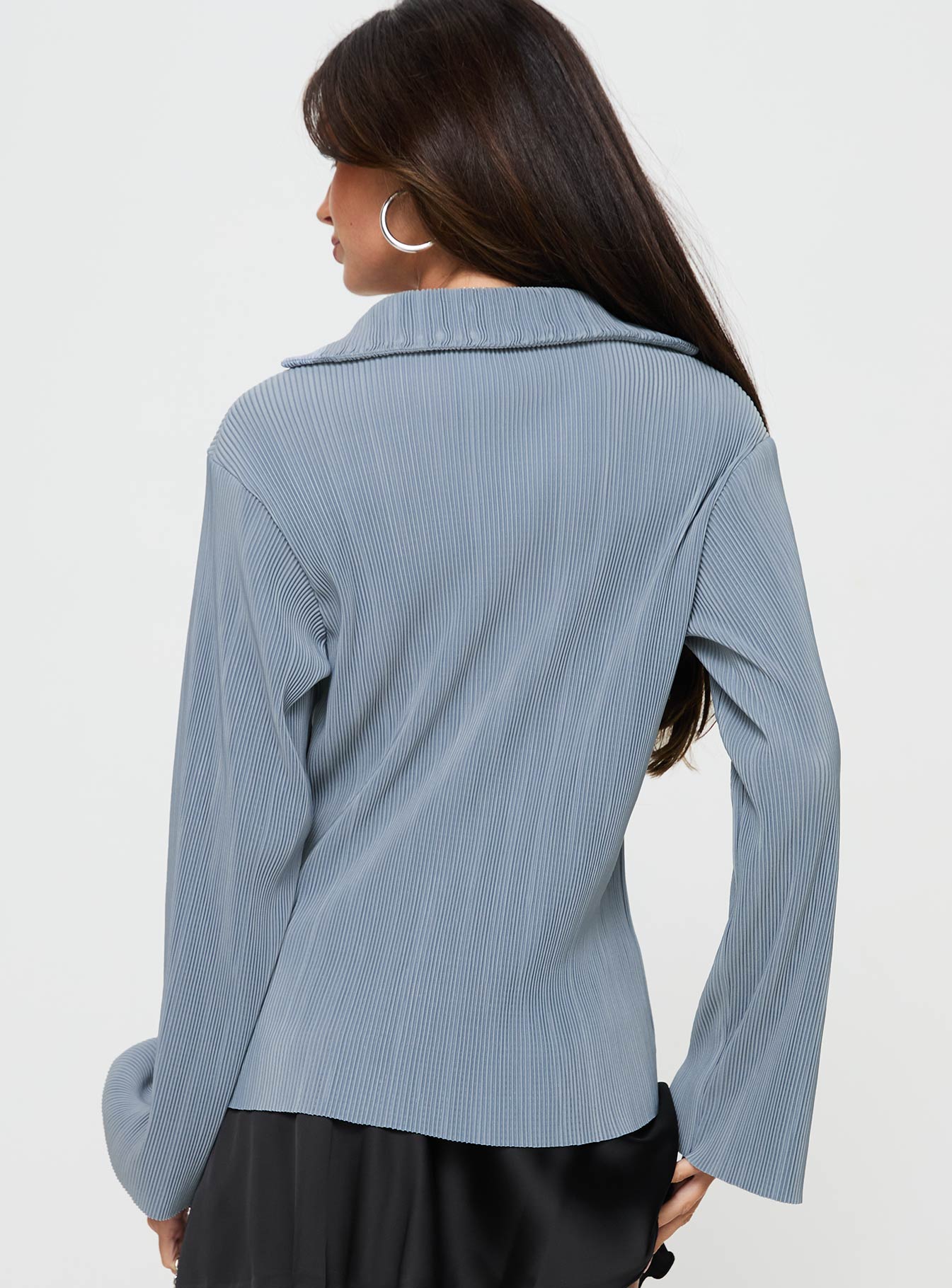 back view of model wearing Princess Polly Louie Pleated Shirt Blue Full Sleeves V-Neck 