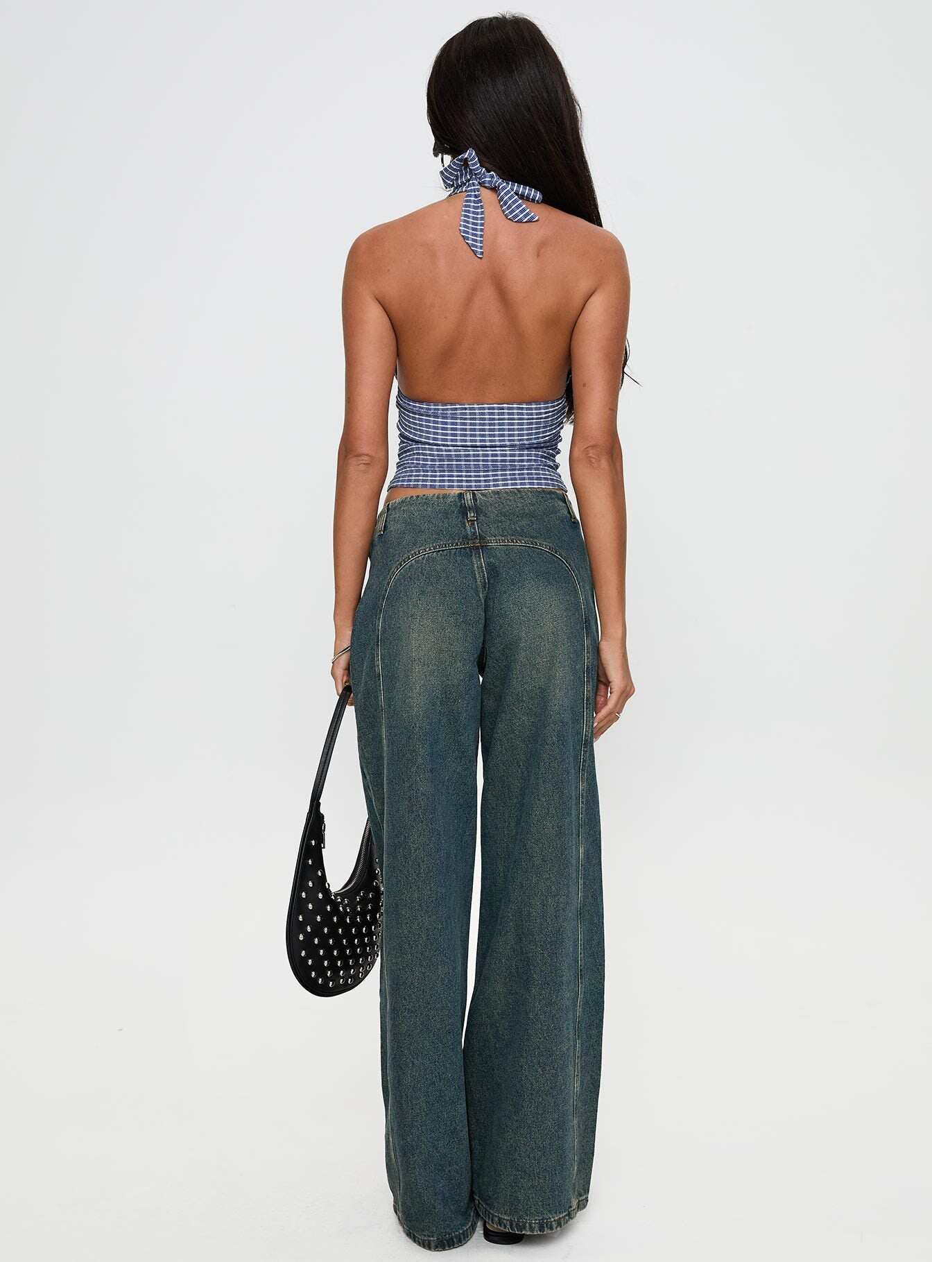 back view of model wearing Princess Polly San Mateo Tie Up Jeans Vintage Wash Low Rise Jeans 