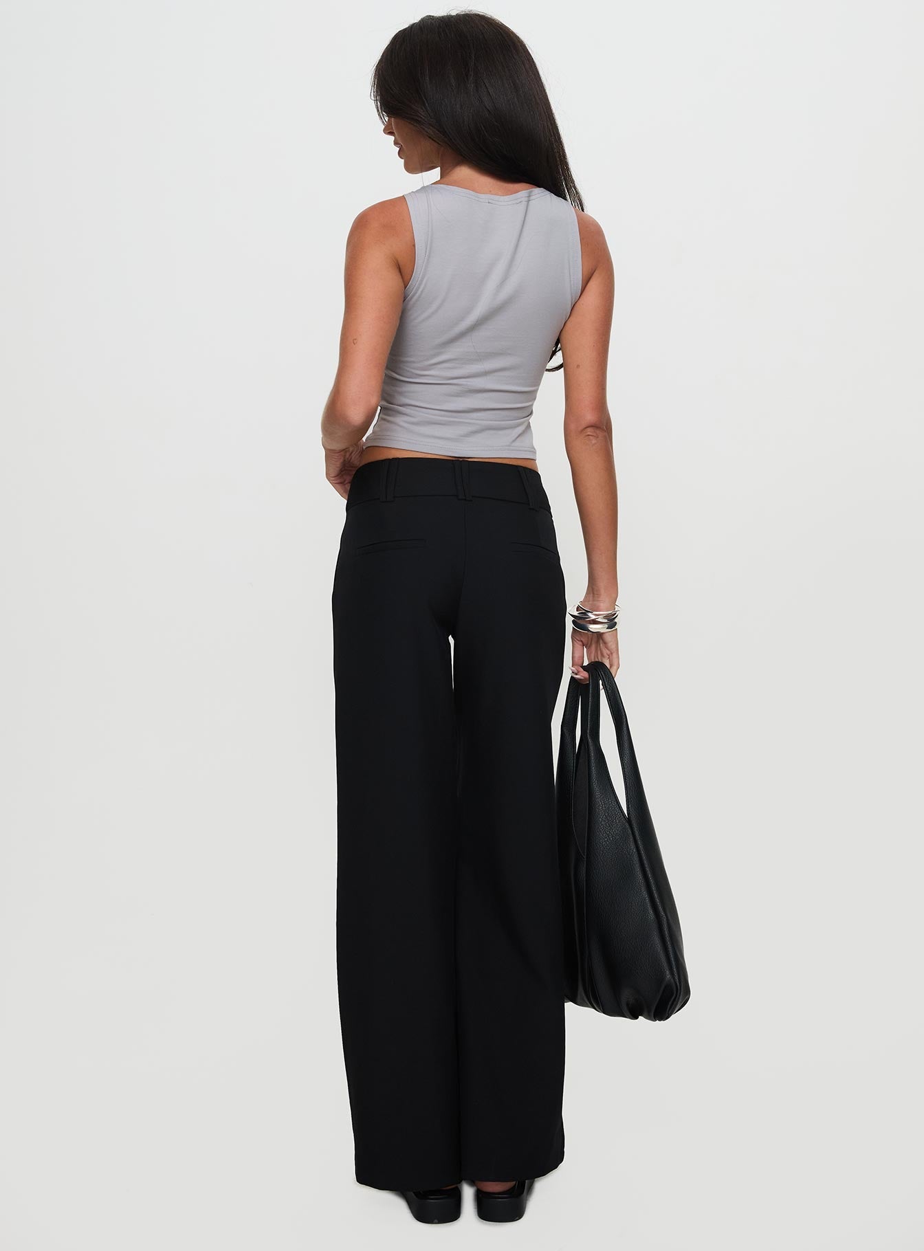 back view of model wearing Princess Polly Two Lovers Low Rise Pants Black High Waisted Pants 