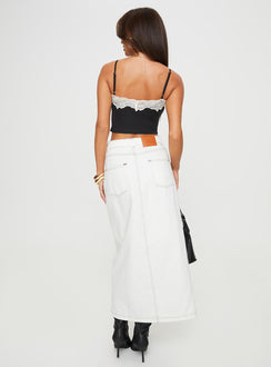 Denim maxi skirt Mid rise, belt looped waist, zip and button fastening, five pocket design, split at front