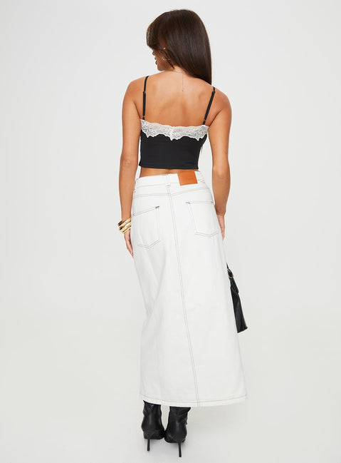 Denim maxi skirt Mid rise, belt looped waist, zip and button fastening, five pocket design, split at front