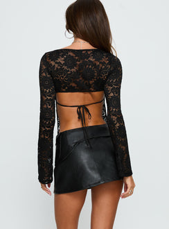 back view of model wearing Princess Polly Sonic Sound Faux Leather Cargo Mini Skirt Black Mini Skirts 