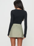 Mini skirt Belt looped waist, button & zip fastening, twin hip pockets, twin cargo leg pockets Non-stretch material, unlined 