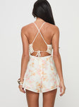 Romper V neckline, open back with cross over detail, invisible zip fastening Non-stretch material, fully lined 