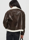 Shearling jacket Oversized fit, classic collar, drop shoulder, exposed zip, twin pockets Non-stretch material, shearling lining