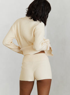 back view of model wearing Princess Polly Jhett Knit Shorts Cream High Waisted Shorts 