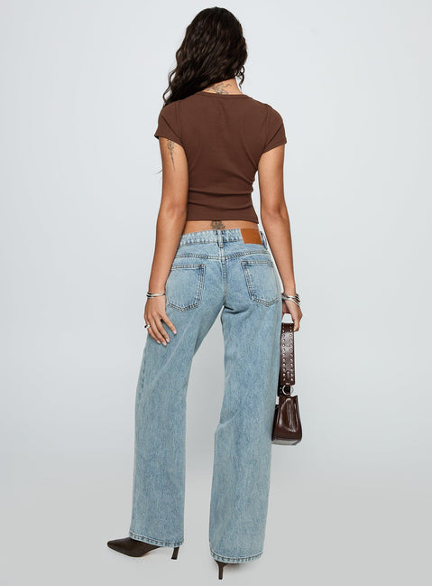 back view of model wearing Princess Polly Ellanor Low Rise Slouch Denim Jean Light Blue Low Rise Jeans 