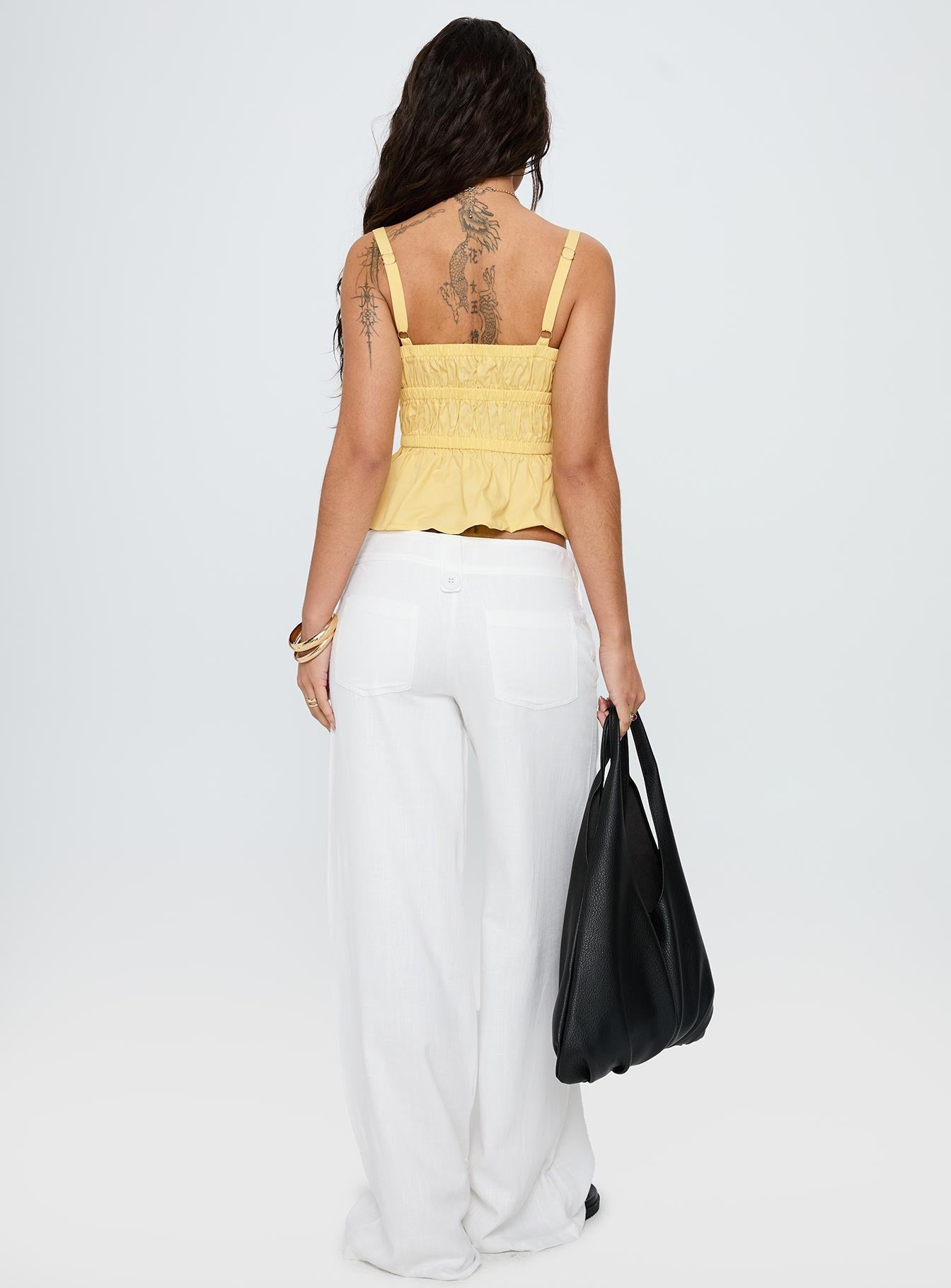 back view of model wearing Princess Polly Pedra Wide Leg Pant White Low Rise Pants 