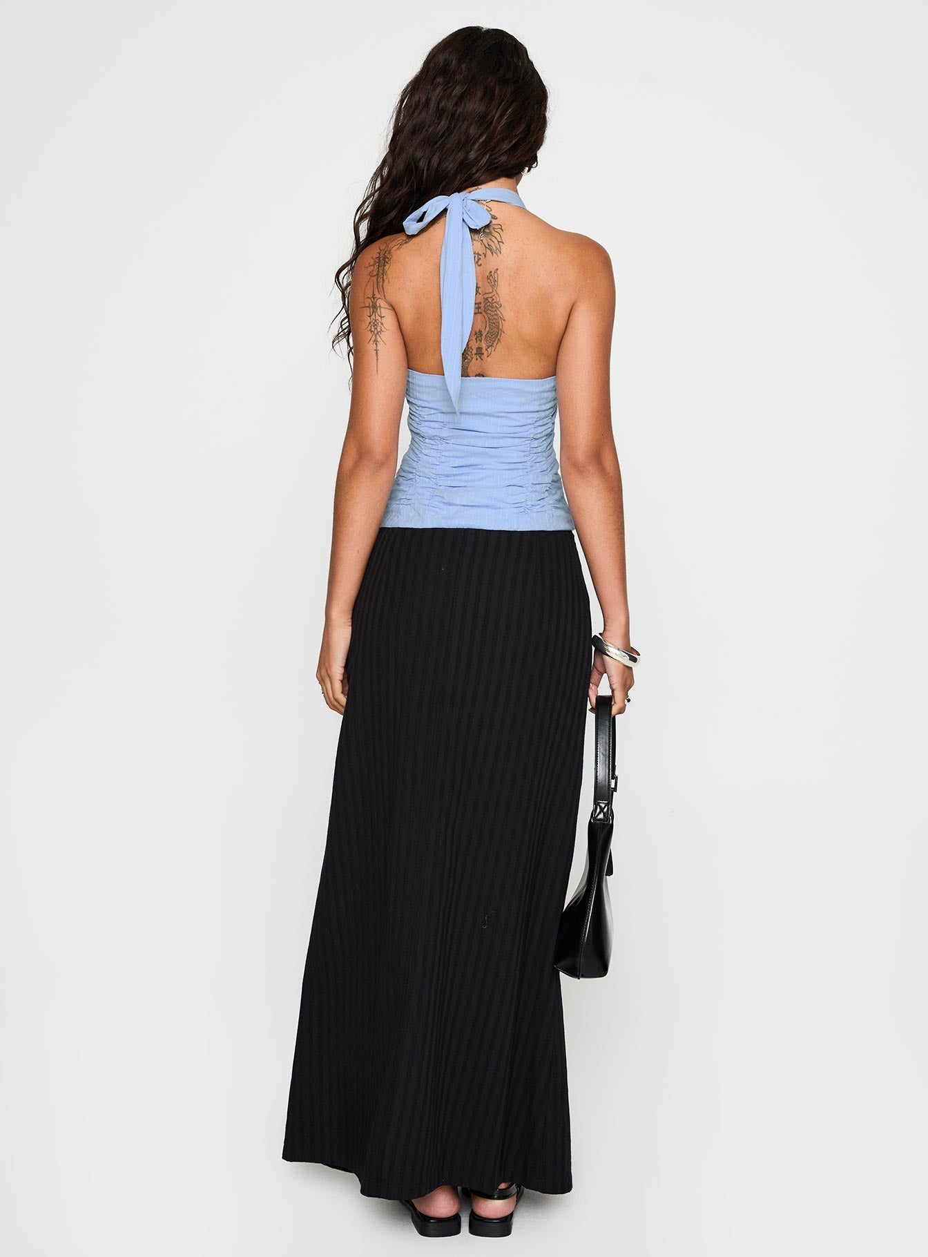back view of model wearing Princess Polly Livie Maxi Skirt Black Maxi 