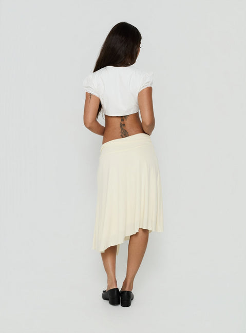 Styled in the Iselda Draped Midi Skirt Cream womens-skirts with solid print back view of model wearing Princess Polly
