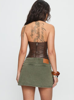 back view of model wearing Princess Polly Generous Wrap Buckle Skort Washed Khaki Mini Skirts Skirts 