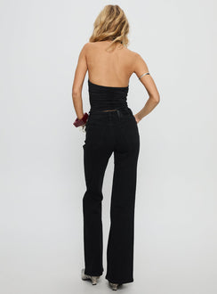 back view of model wearing Princess Polly Magic Mirror Mid Rise Bootleg Jeans Washed Black Mid Rise Jeans 