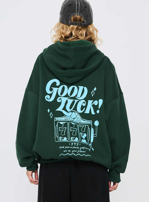 back view of model wearing Princess Polly Good Luck Graphic Hoodie Green / Blue Long 