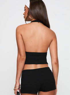 back view of model wearing Princess Polly Obviously Halter Top Black Sleeveless Plunger 