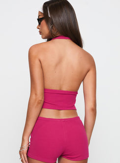 back view of model wearing Princess Polly Obviously Halter Top Pink Sleeveless Plunger 