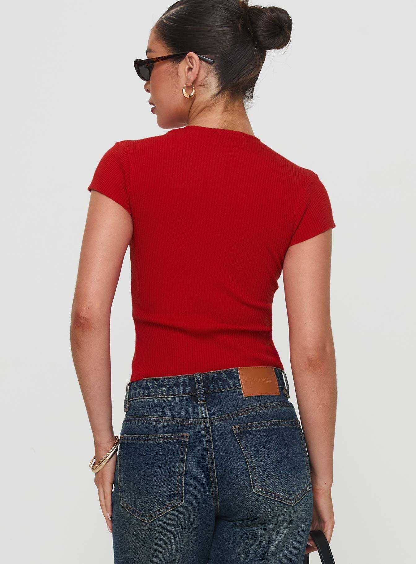 back view of model wearing Princess Polly Suzu Top Red Short Sleeves High Neck 