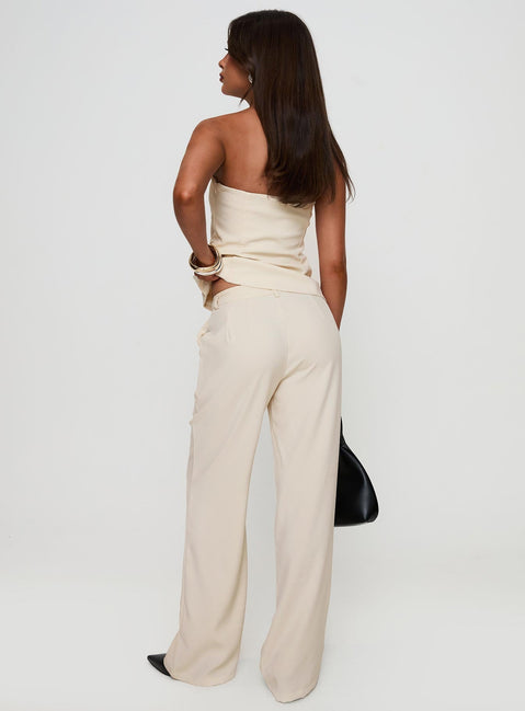 back view of model wearing Princess Polly Irresistible Wide Leg Pant Cream Petite High Waisted Pants 
