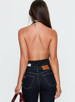 back view of model wearing Princess Polly Cleona Plunge Neck Bodysuit Black Polka Sleeveless 