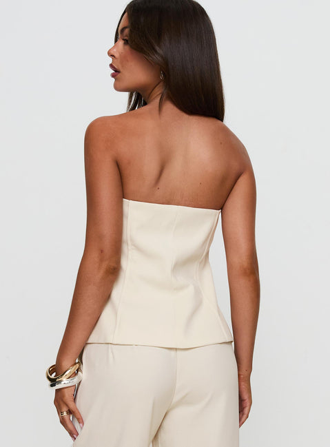 back view of model wearing Princess Polly Lavish Living Strapless Top Cream Sleeveless straight 